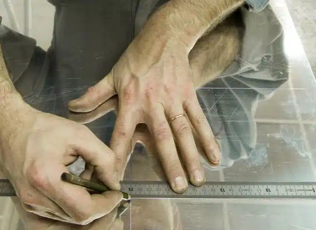 Silversmith working on a silver band to start a new project