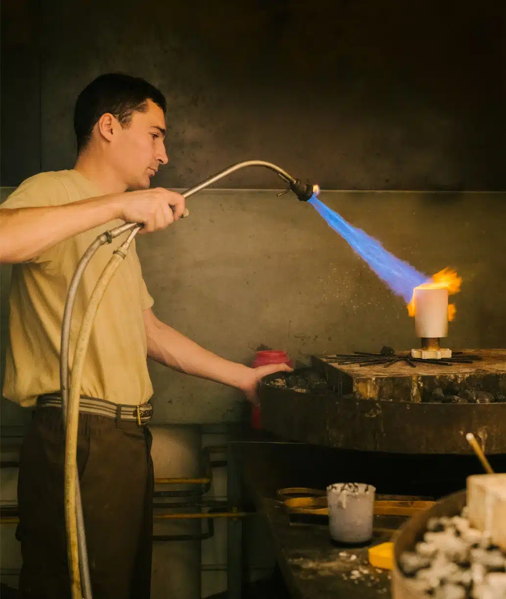 Silversmith working on a prestige piece in sterling silver