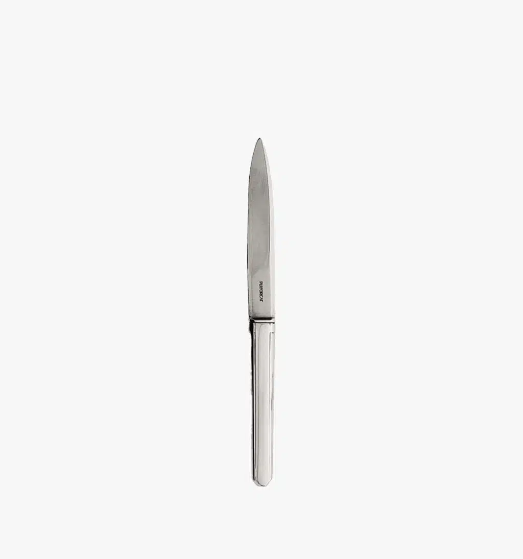 Dessert knife in stainless steel from the Guéthary collection by Puiforcat on a light background