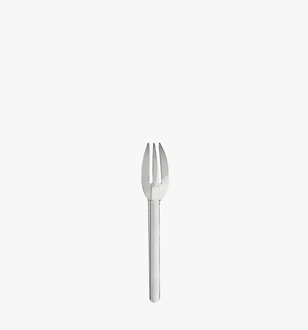 Salad fork in stainless steel from the Guethary collection by Puiforcat on a light background.