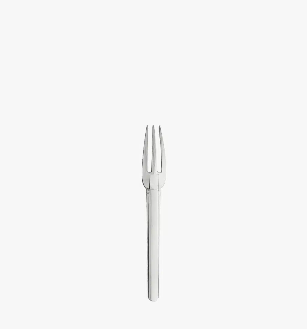 Stainless steel dessert fork from the Guéthary collection on a light background