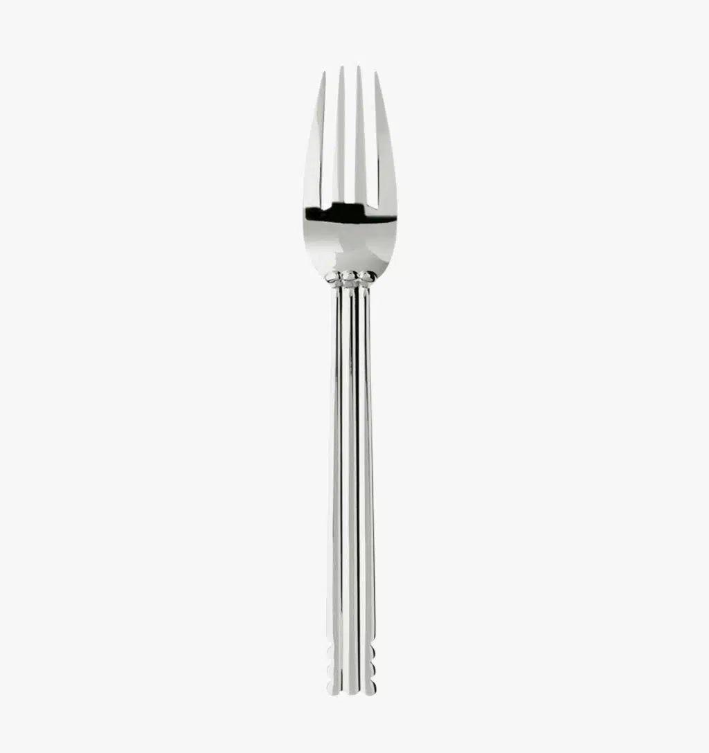 Dessert fork in silver plated from the Nantes collection by Puiforcat on a light background.